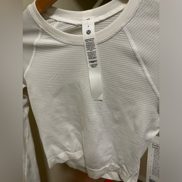 2 New With Tags Swiftly Tech Cropped Long-Sleeve
Shirts 2.0 - Picture 15 of 16